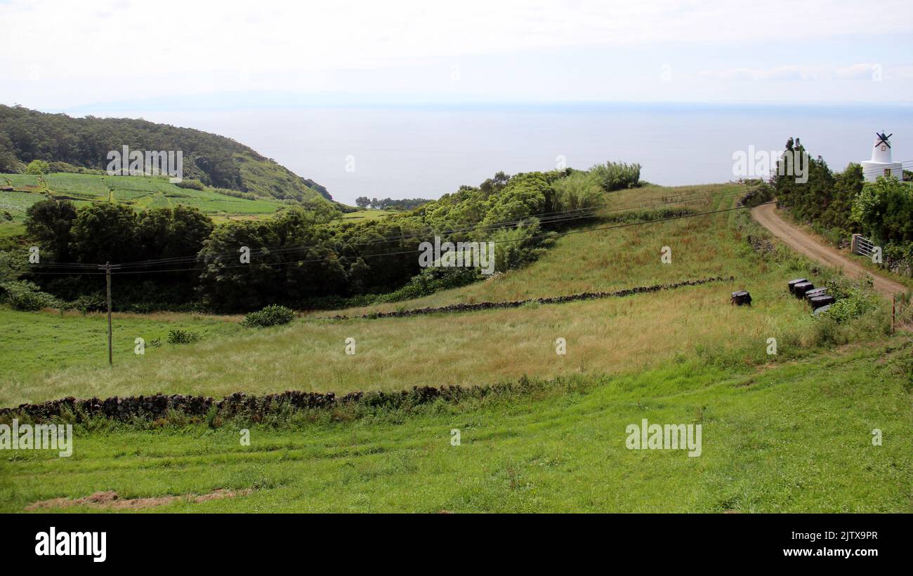 Rural landscape rolling toward Atlantic Ocean, on the North side of the island, Terceira Island, Azores, Portugal Stock Photo