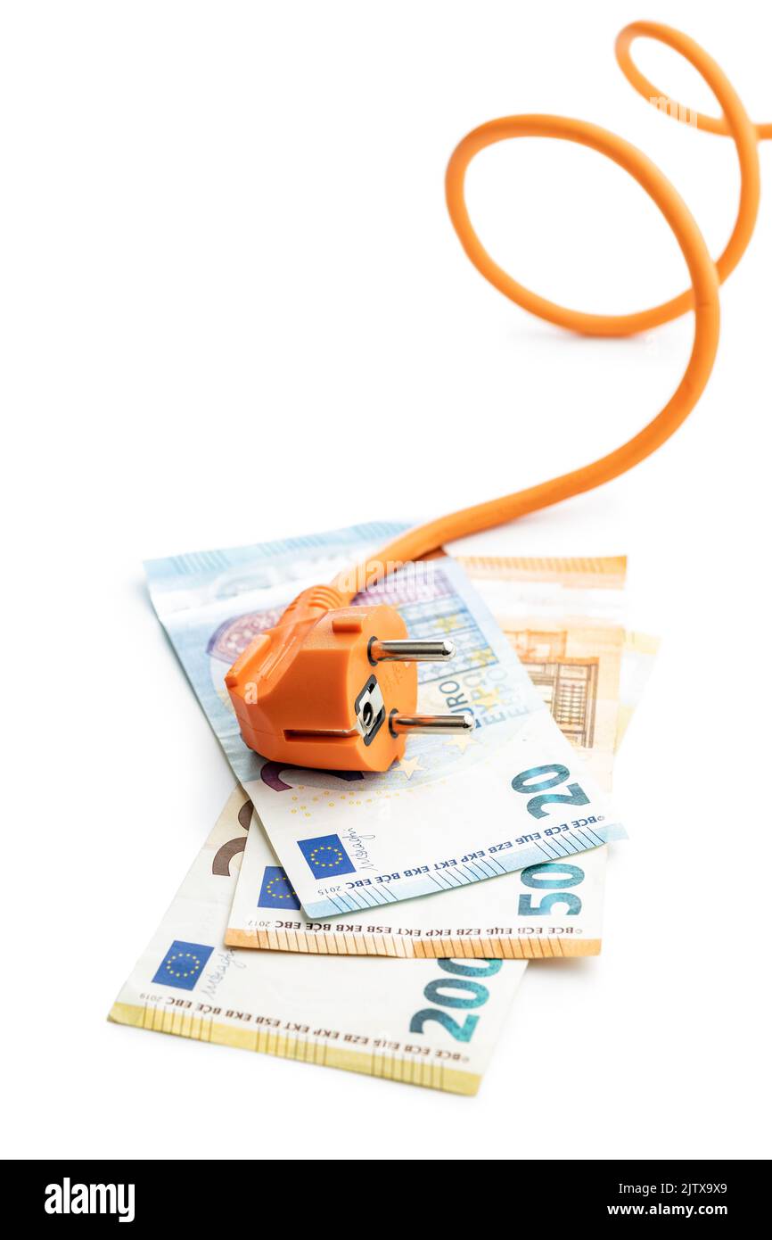 Electric plug and euro paper money isolated on the white background. Concept of increasing electricity prices. Stock Photo