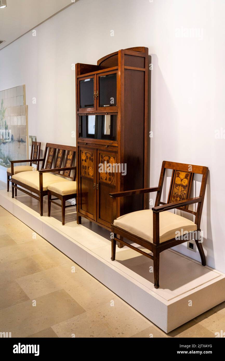 chairs and showcase, Gaspar Homar Mezquida, 1910, wood and marquetry, Museu de Mallorca, Palma, Majorca, Spain. Stock Photo