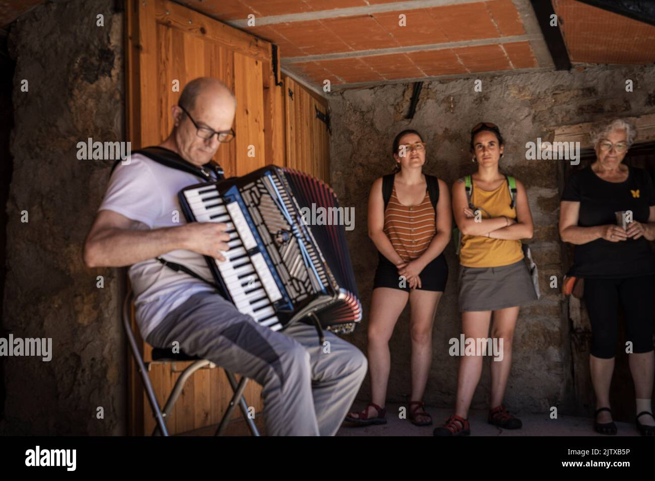 accordionist playing, Maçaners, Bergueda, Catalonia, Pyrenean mountain range, Spain. Stock Photo