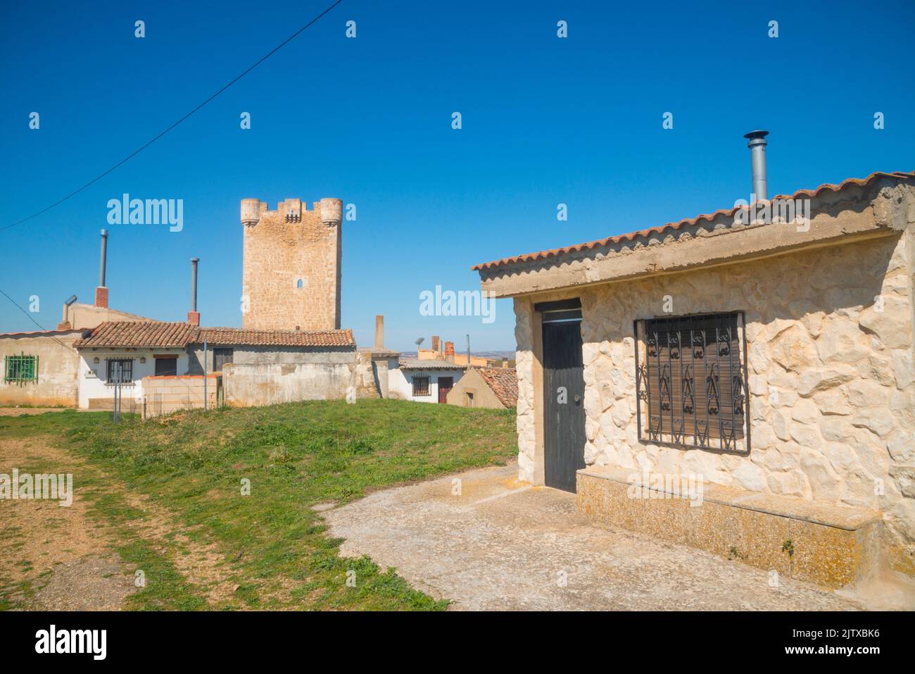Traditional wine cellars and Hoyales Tower. Hoyales de Roa, Burgos province, Castilla Leon, Spain. Stock Photo