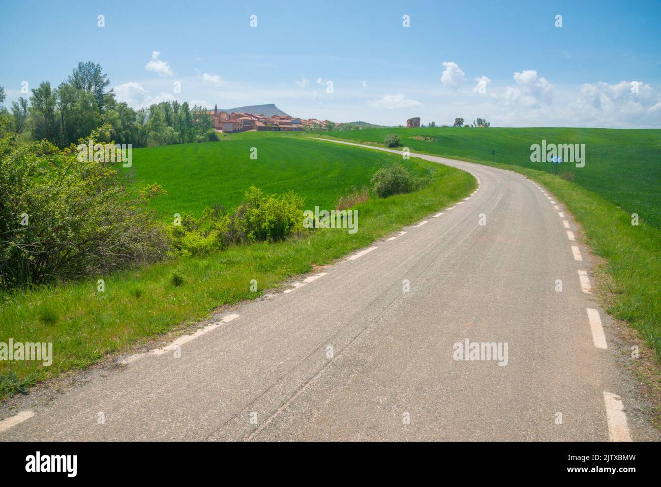 Road and village. Noviales, Soria province, Castilla Leon, Spain. Stock Photo