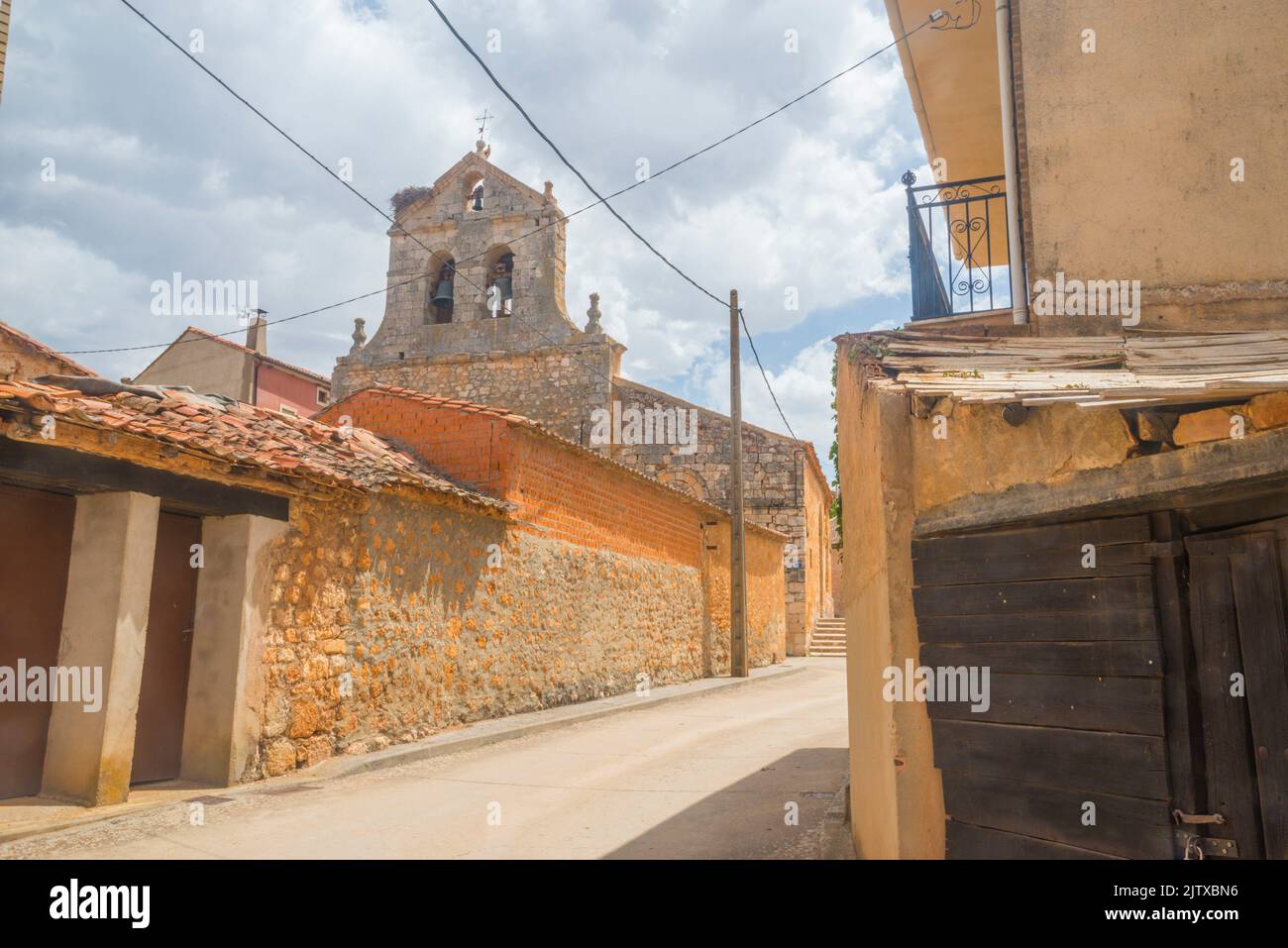 Street and church. Languilla, Segovia province, Castilla Leon, Spain. Stock Photo