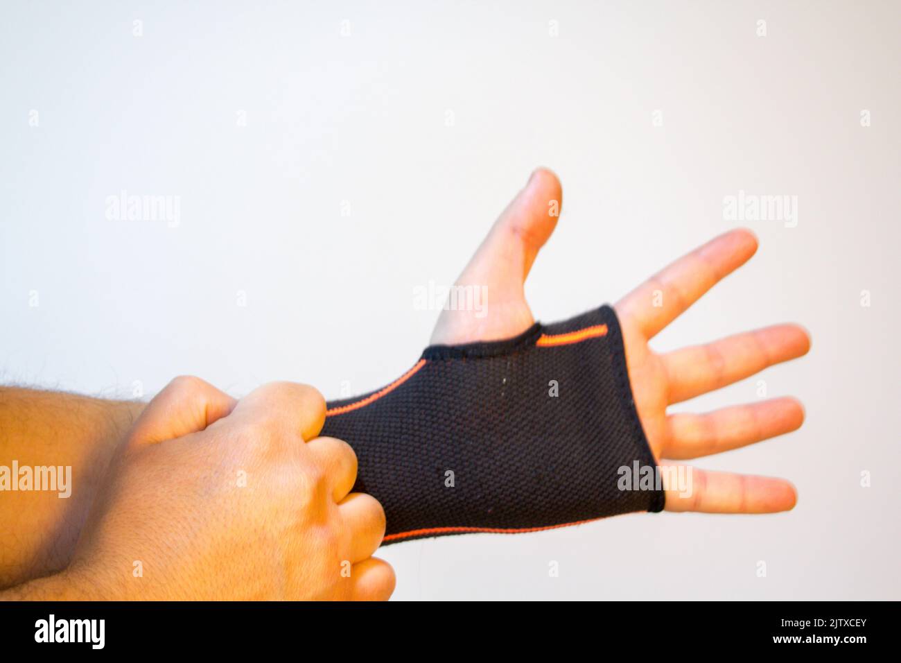hand with wrist brace for tendonitis problems Stock Photo Alamy