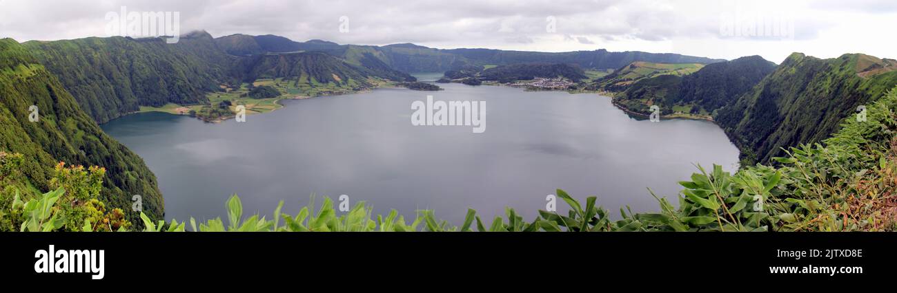 Blue Lake, Lagoa Azul, view from Northern point, Miradouro das Cumeeiras, in Southern direction, panoramic shot, Sete Cidades, Sao Miguel Island Stock Photo