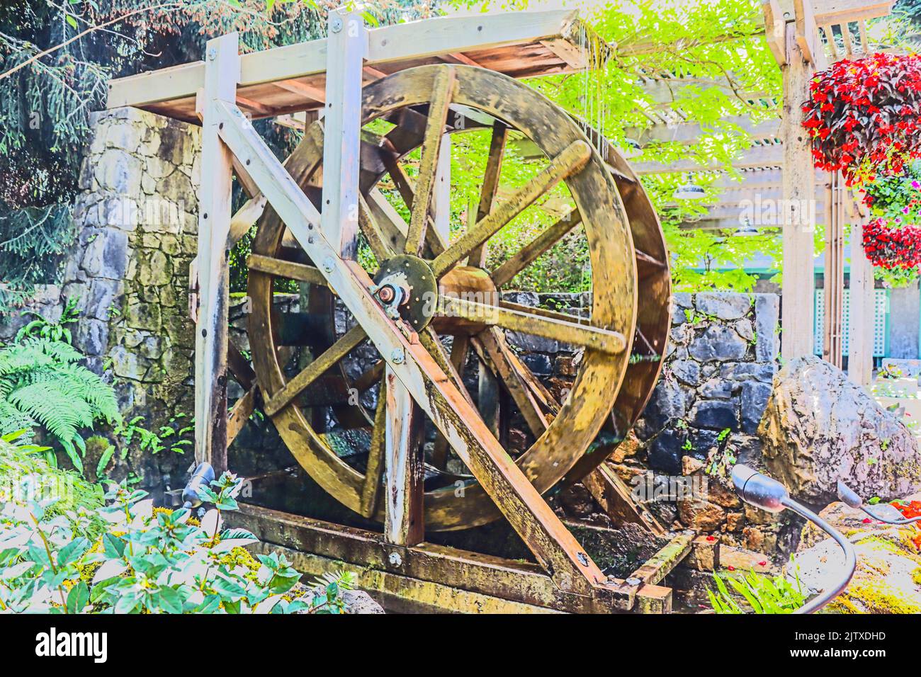 Water Wheel at Butchart Gardens located in Brentwood Bay, British Columbia, Canada. Stock Photo