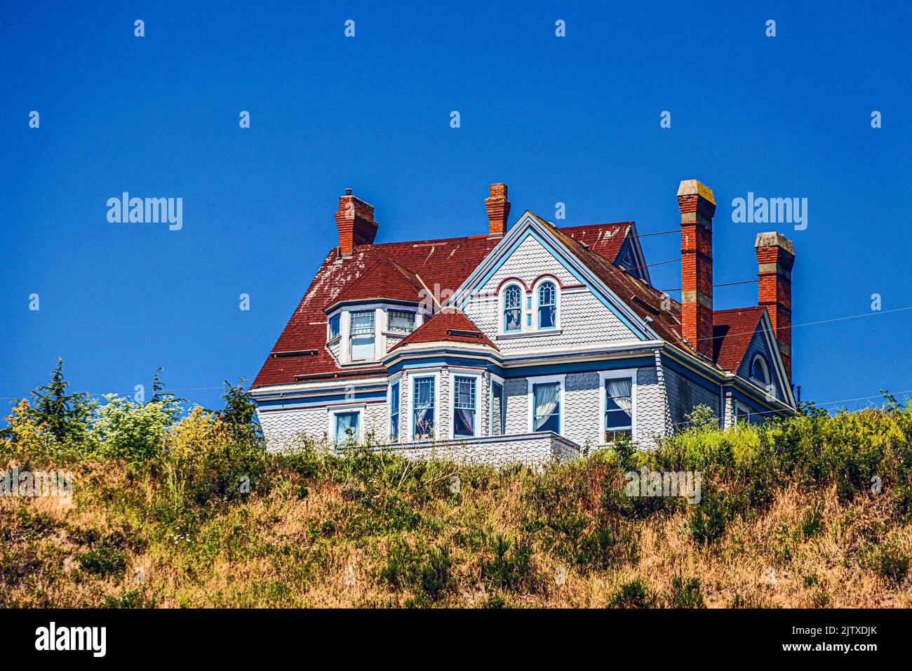 The four-chimneyed, three-story Francis Wilcox James House is among the more spectacular of the many Victorian houses in Port Townsend. Located on a Stock Photo