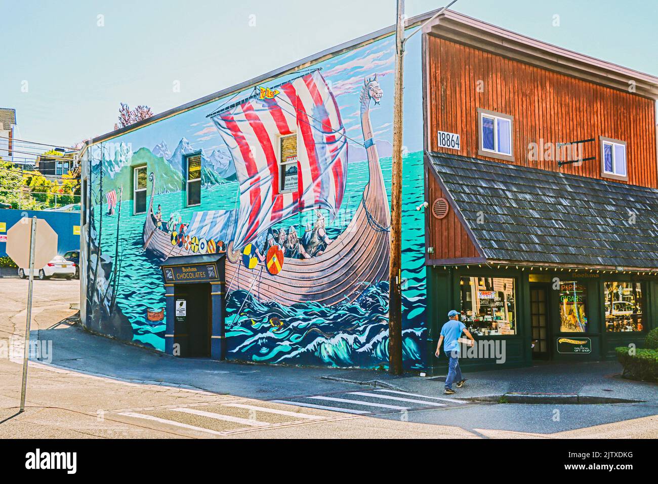 Mural in Poulsbo (known as Little Norway) Washington showing Vikings on a Longship. The mural was painted by James R, Mayo in 2011 on Boehm's Stock Photo
