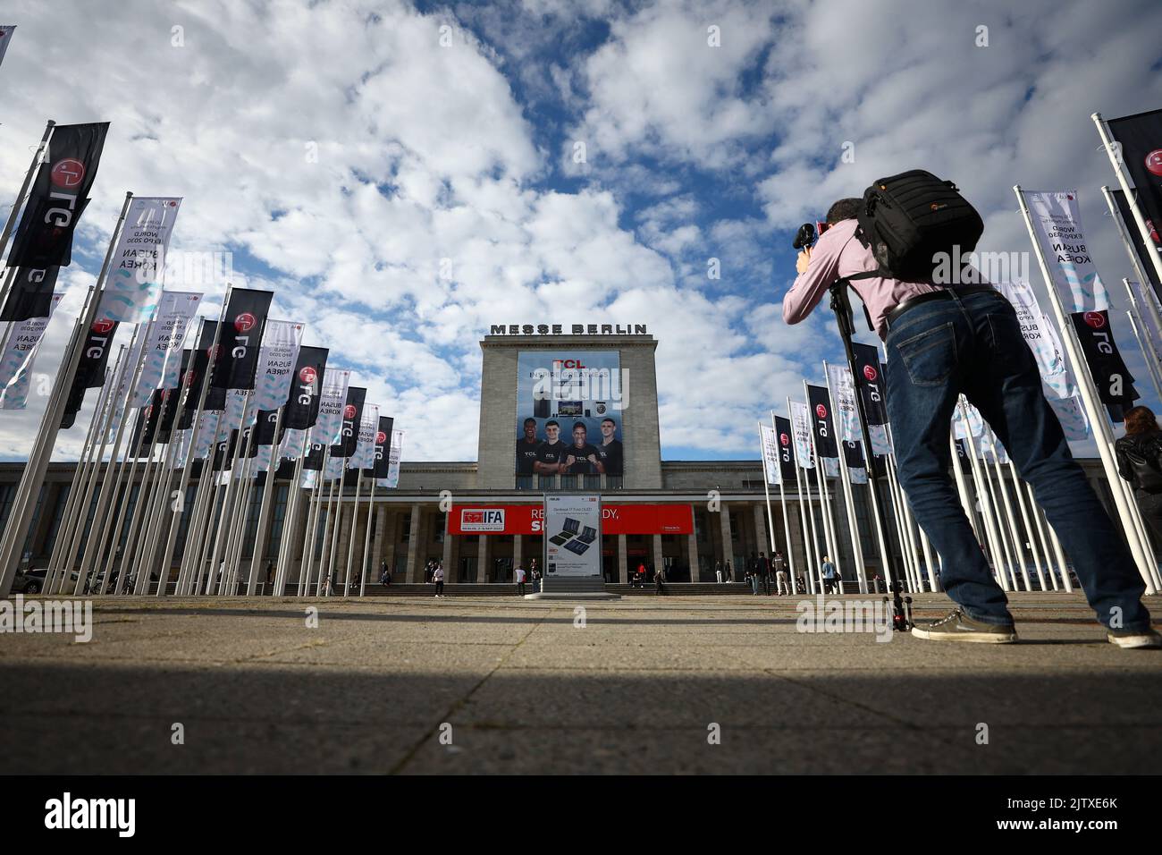 Visitors walk at the entrance to the international consumer technology fair IFA in Berlin, Germany September 2, 2022. REUTERS/Lisi Niesner Stock Photo