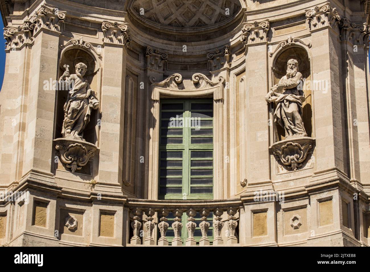 Sculptural detail of façade of Basilica della Collegiata (Ancient Royal and Eminent Basilica Collegiate of Our Lady of the Alms). Via Etnea, Stock Photo