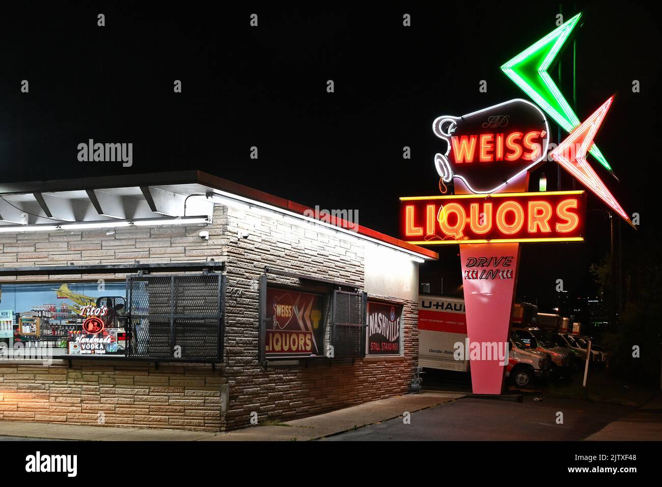 Illuminated sign Weiss Liquors in East Nashville ; Nashville, Tennessee, United States of America Stock Photo