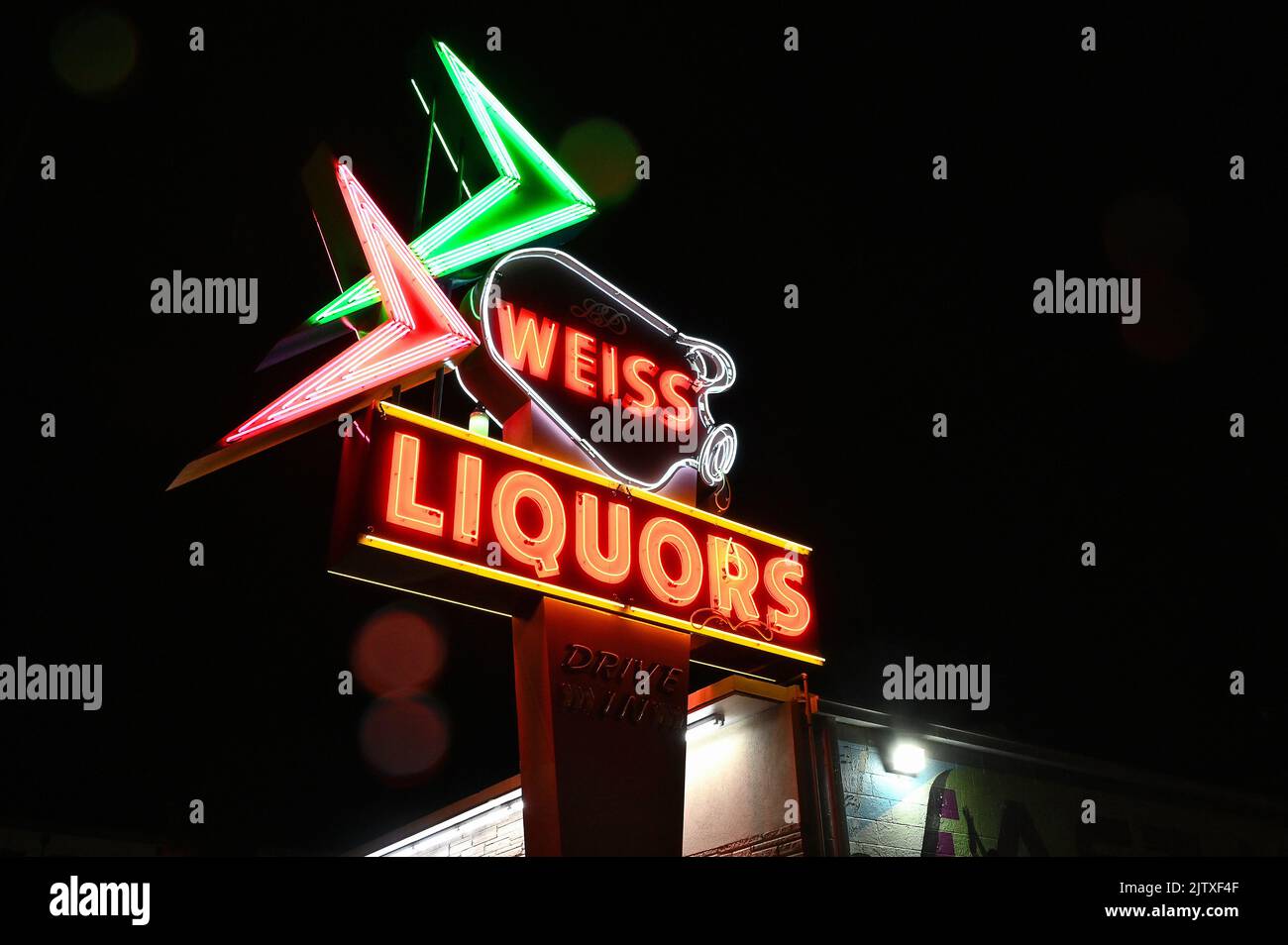 Illuminated sign Weiss Liquors in East Nashville ; Nashville, Tennessee, United States of America Stock Photo
