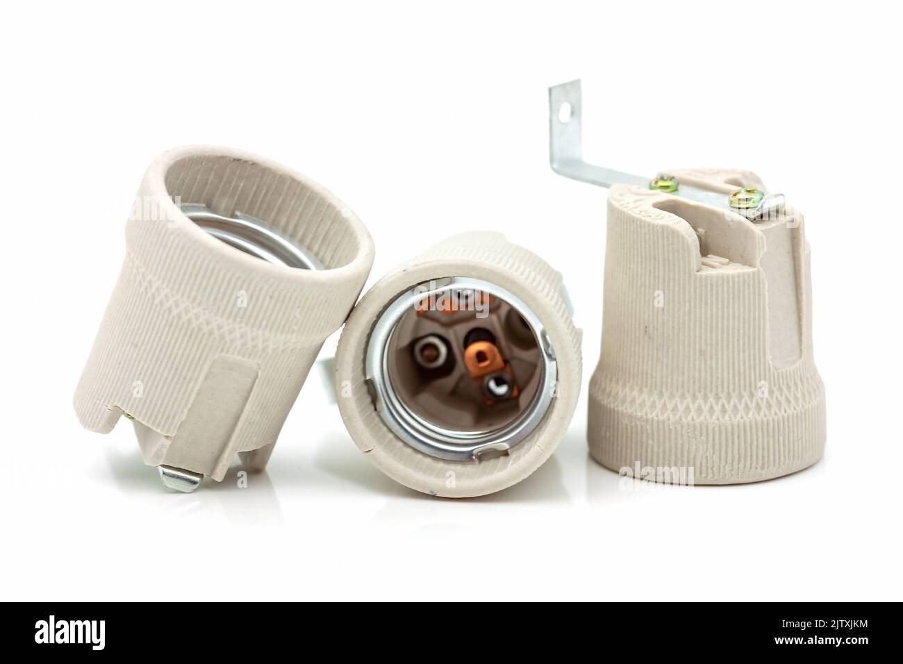 Electric ceramic socket model E27, for lighting. Selective focus with shallow depth of field. Stock Photo