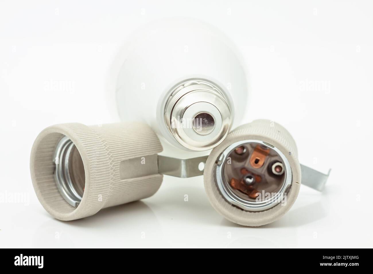 Electric ceramic socket model E27, for lighting. Selective focus with shallow depth of field. Stock Photo