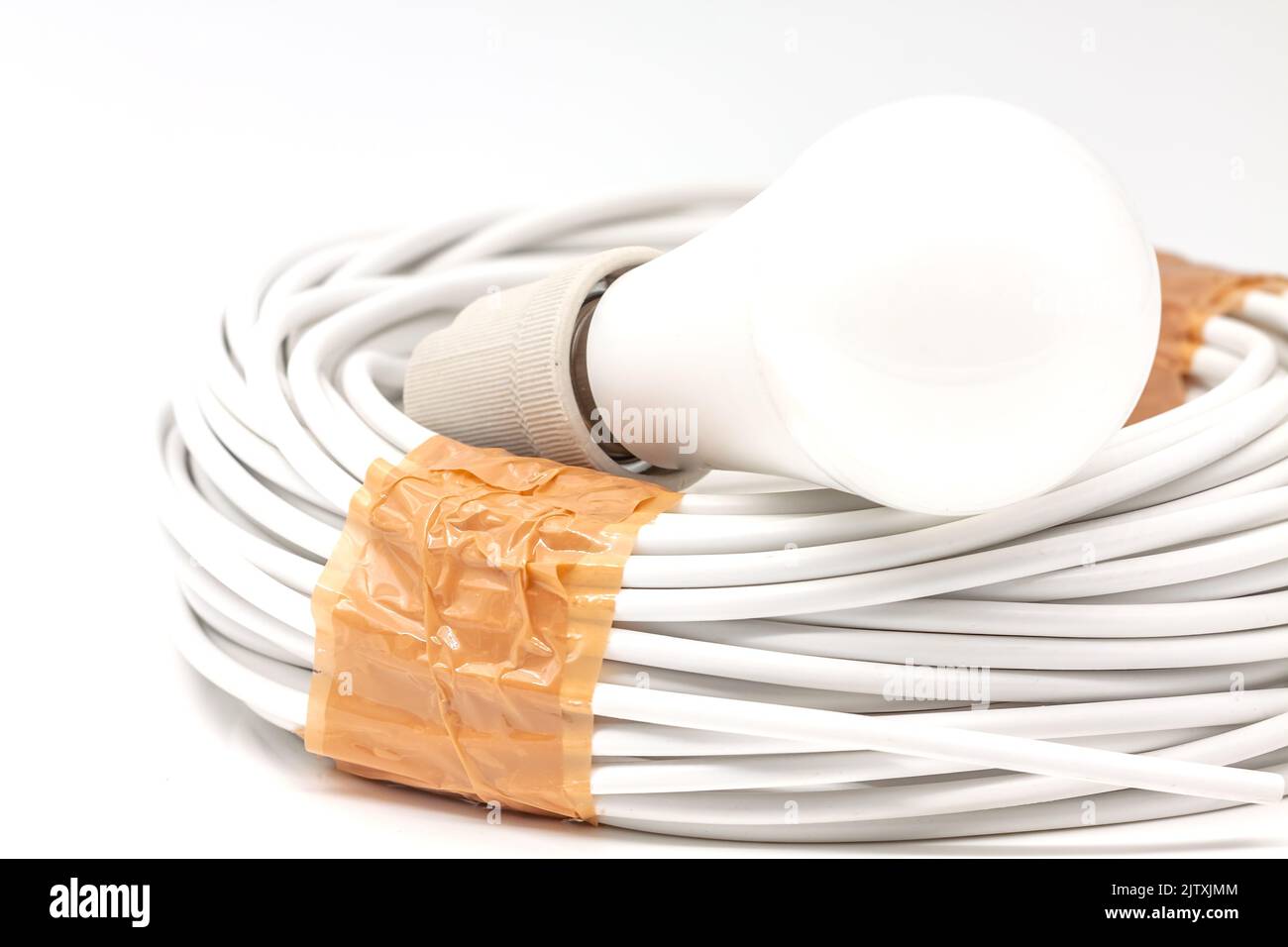 Electric ceramic socket model E27, for lighting. Selective focus with shallow depth of field. Stock Photo