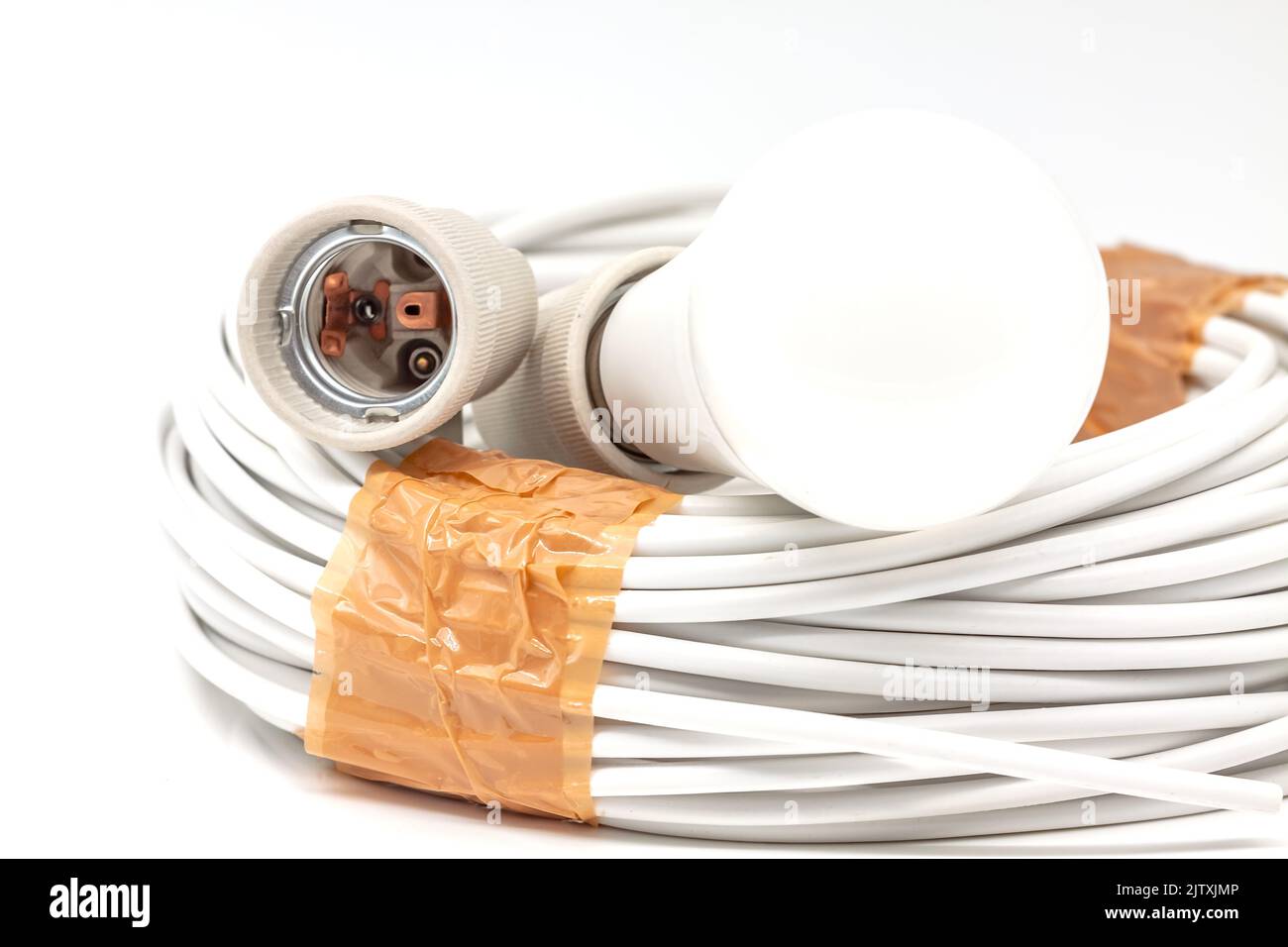 Electric ceramic socket model E27, for lighting. Selective focus with ...