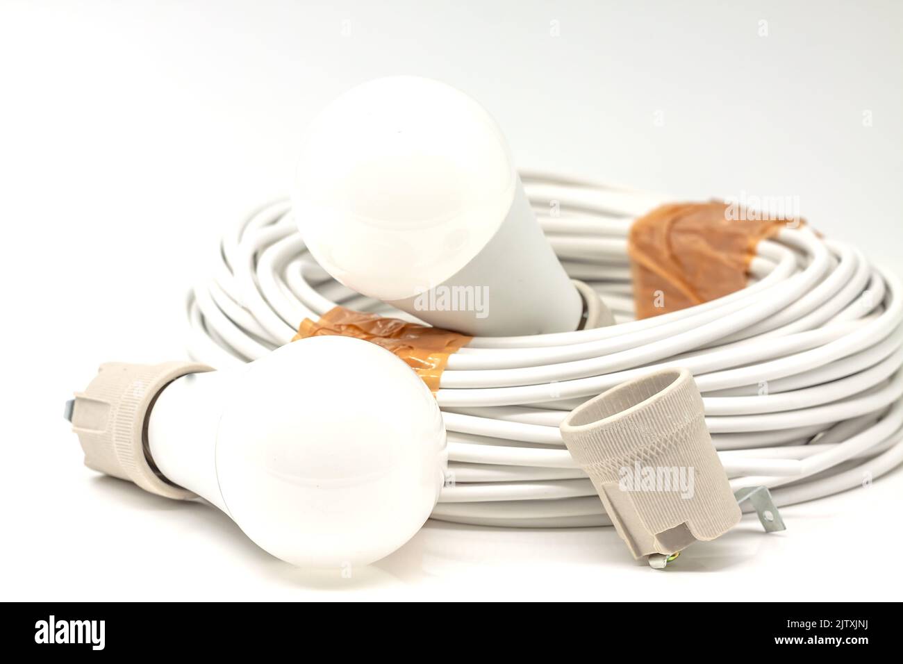 Electric ceramic socket model E27, for lighting. Selective focus with shallow depth of field. Stock Photo