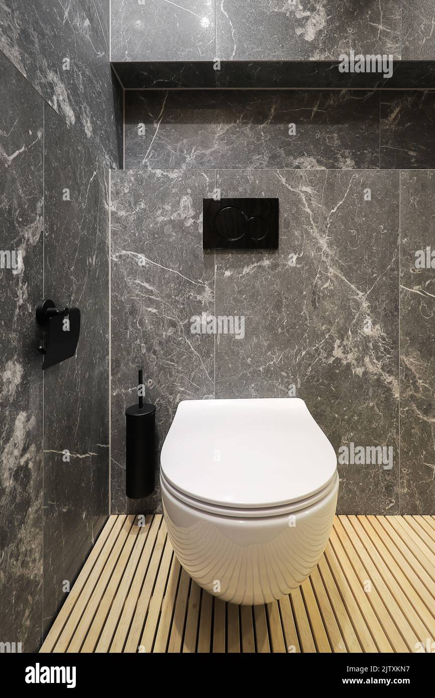 White toilet bowl in a modern bathroom interior Stock Photo - Alamy