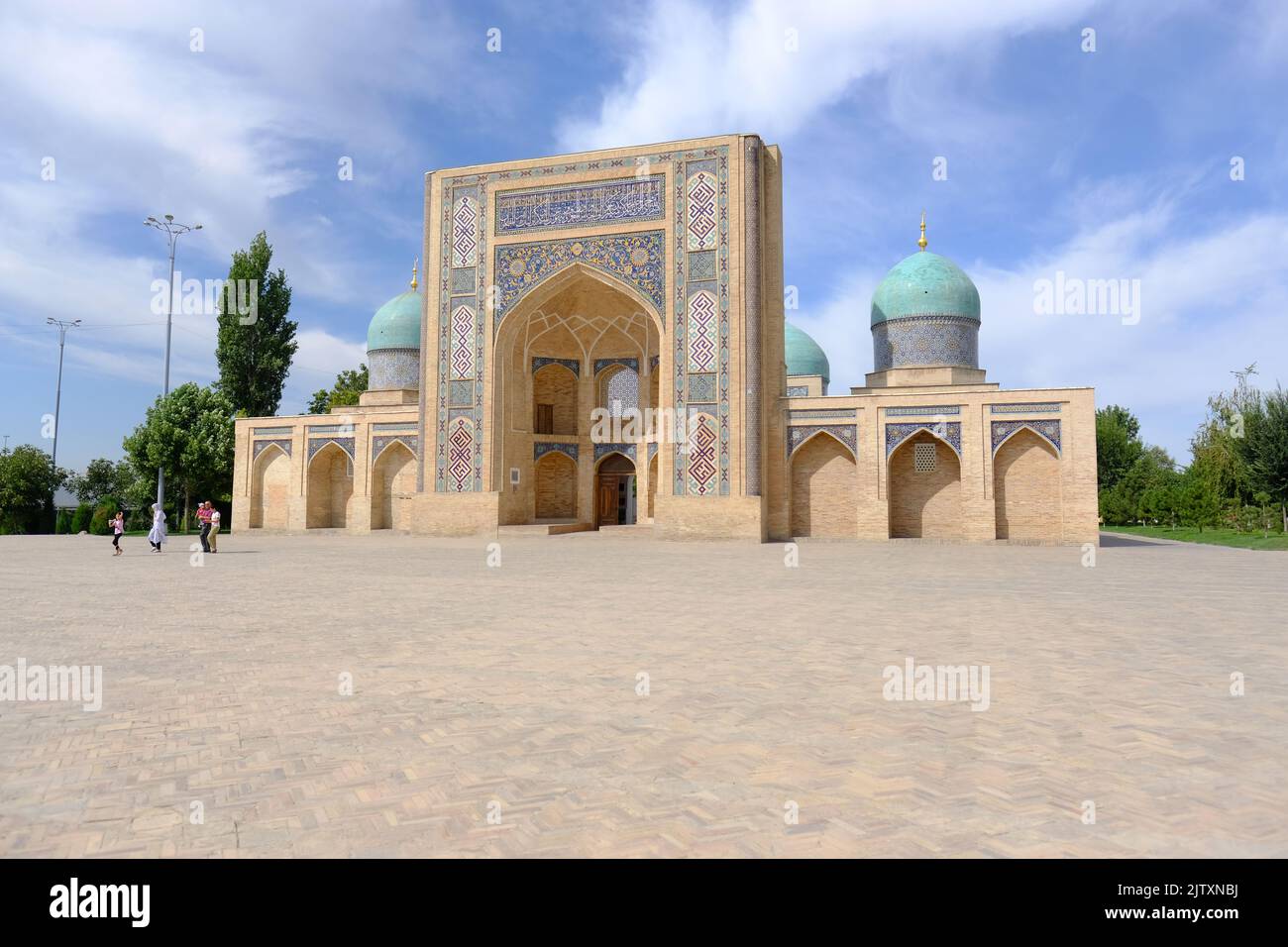 Tashkent Uzbekistan visitors at the Barak Khan Madrasa built in the 16th Century Stock Photo