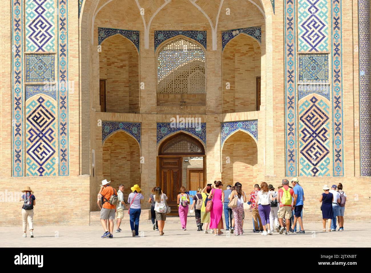 Tashkent Uzbekistan visitors at the Barak Khan Madrasa built in the 16th Century Stock Photo