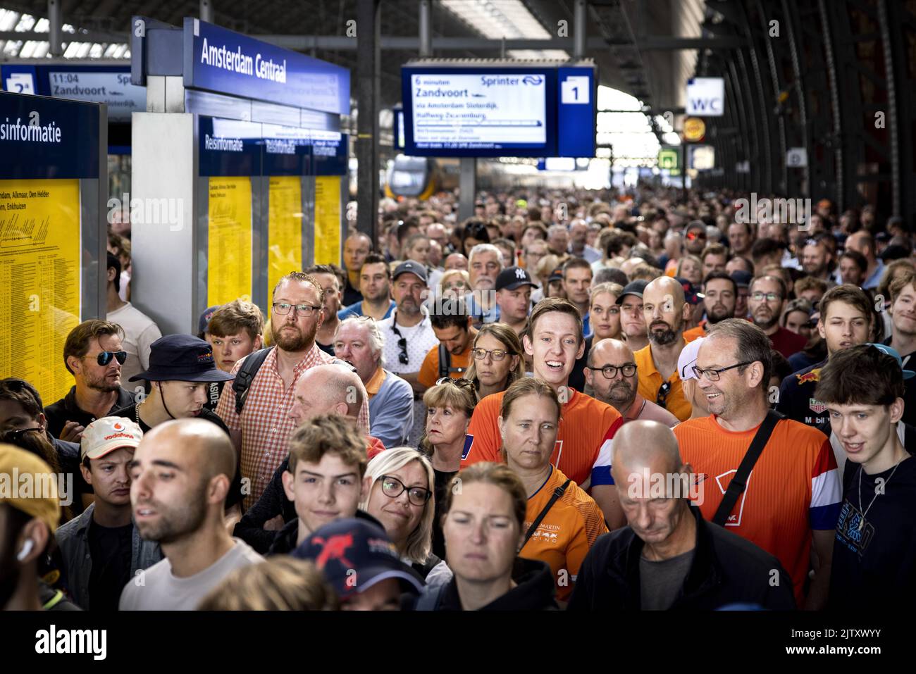 2022-09-02 11:05:30 AMSTERDAM - Amsterdam Central is busy with people who want to go to Zandvoort. That's where the Formula 1 starts. Because big crowds were expected, the NS has a train running every five minutes between Amsterdam Central and Zandvoort aan Zee station. ANP RAMON VAN FLYMEN netherlands out - belgium out Stock Photo