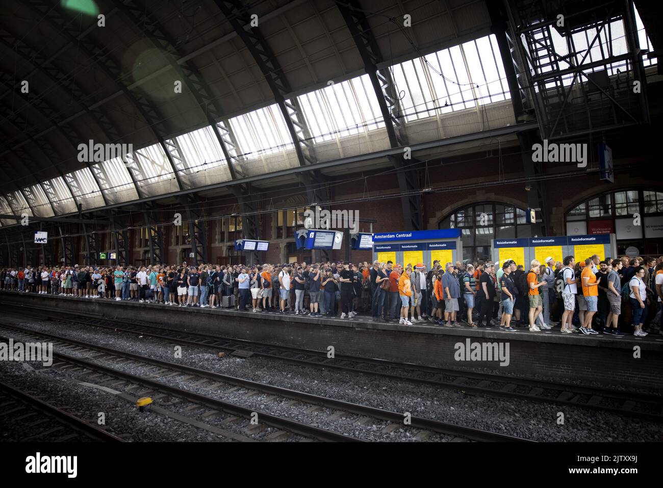 2022-09-02 10:52:10 AMSTERDAM - Amsterdam Central is busy with people who want to go to Zandvoort. That's where the Formula 1 starts. Because big crowds were expected, the NS has a train running every five minutes between Amsterdam Central and Zandvoort aan Zee station. ANP RAMON VAN FLYMEN netherlands out - belgium out Stock Photo