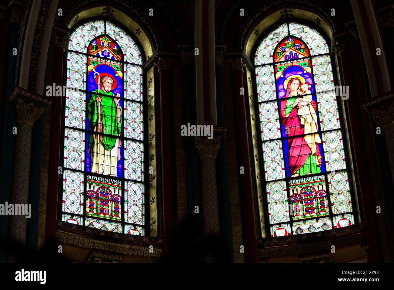 Saint Mary with Child and Saint Denis - Stained glass windows of Abbaye de Saint-Germain-des-Prés - Paris Stock Photo