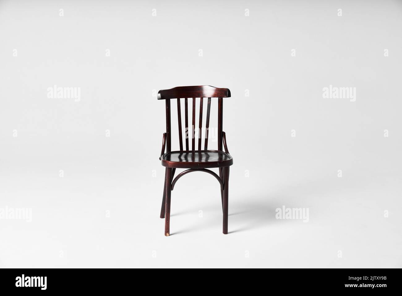 Dark chair on cyclorama under flash light Stock Photo