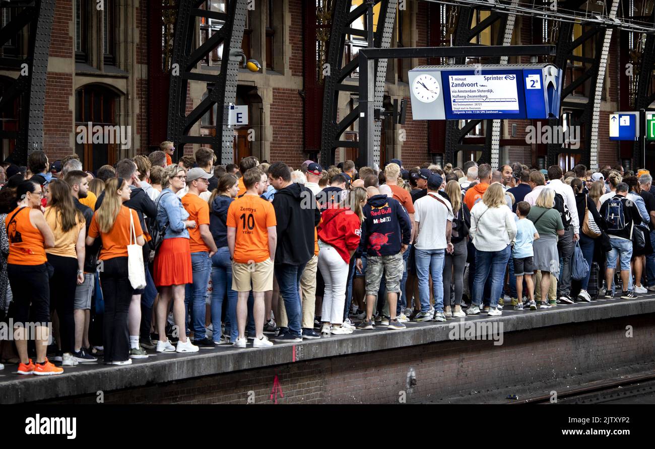 2022-09-02 10:52:43 AMSTERDAM - Amsterdam Central is busy with people who want to go to Zandvoort. That's where the Formula 1 starts. Because big crowds were expected, the NS has a train running every five minutes between Amsterdam Central and Zandvoort aan Zee station. ANP RAMON VAN FLYMEN netherlands out - belgium out Stock Photo
