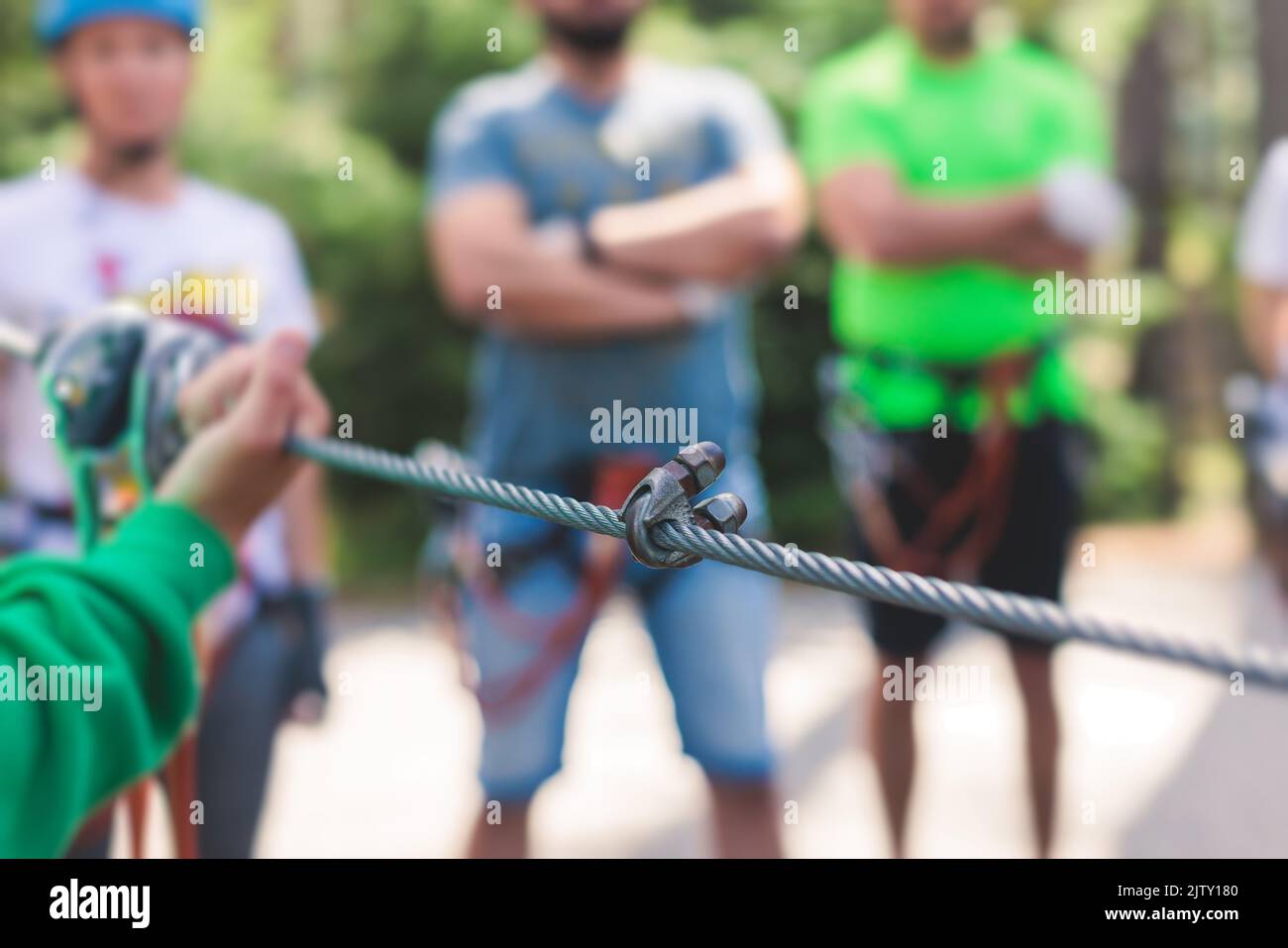 View of high ropes course, process of climbing in amusement acitivity