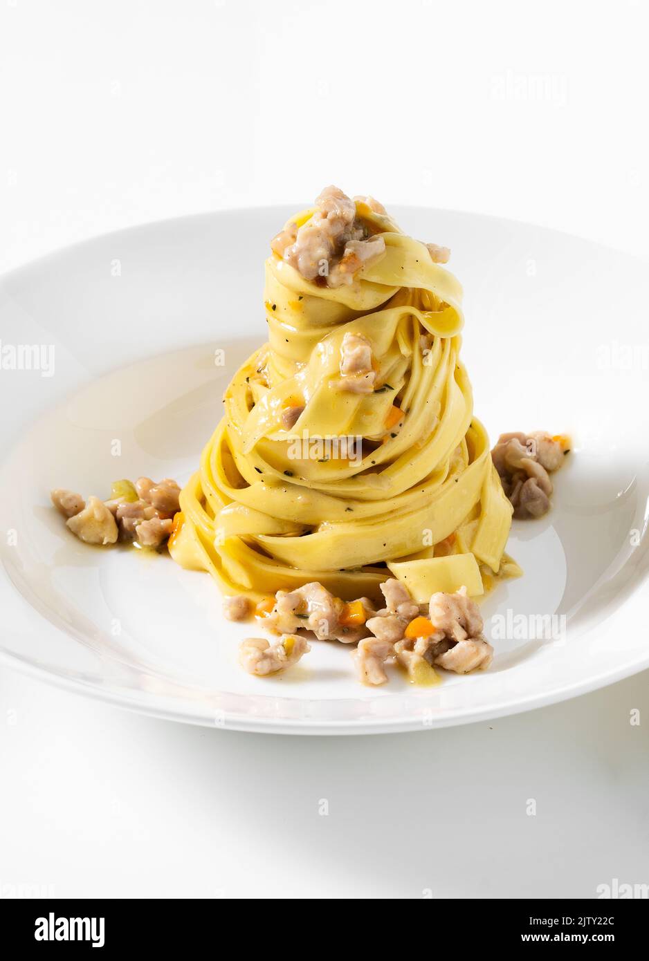 pasta tagliatelle with rabbit sauce on the white table. menu for the ...