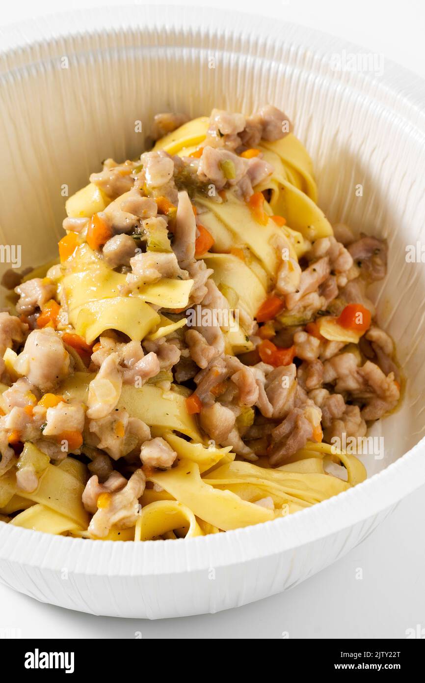 pasta tagliatelle with rabbit sauce. menu for the restaurant in a box for delivery Stock Photo