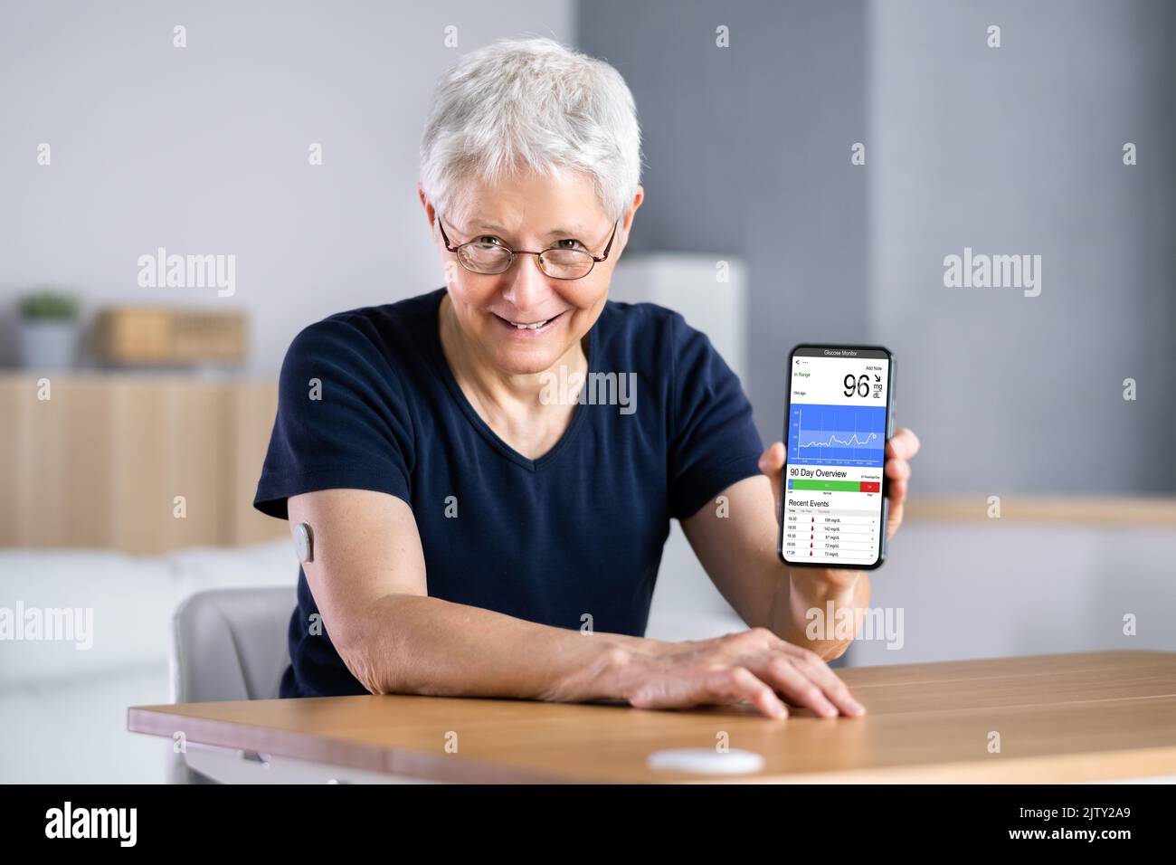 Continuous Glucose Monitor Blood Sugar Test Smart Phone App Stock Photo