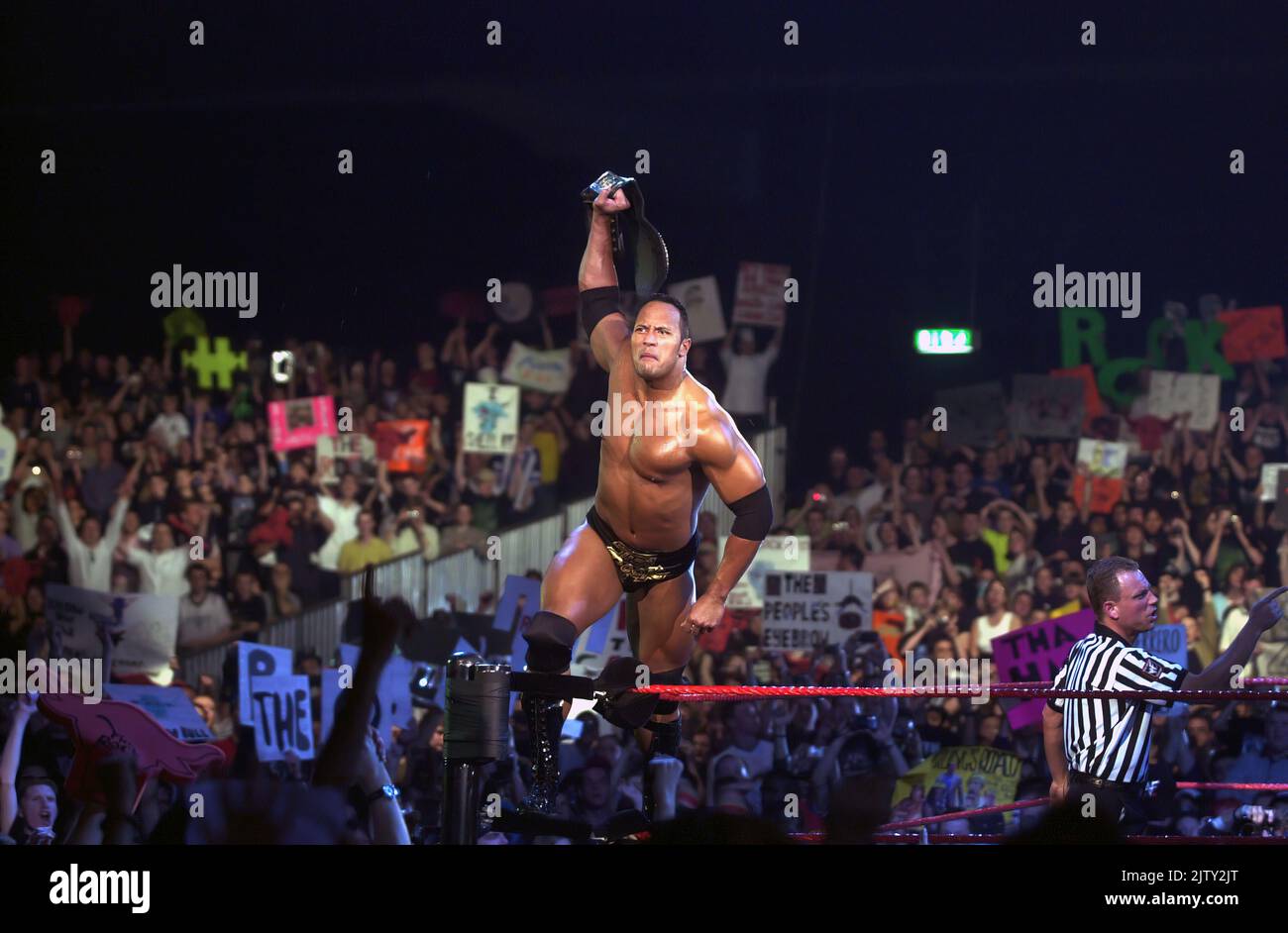 Pic shows; WWF now WWE wrestling in 2000  One of the biggest stars The Rock  - beats Triple H in a bout at Earl’s Court in the first ever British tour Stock Photo