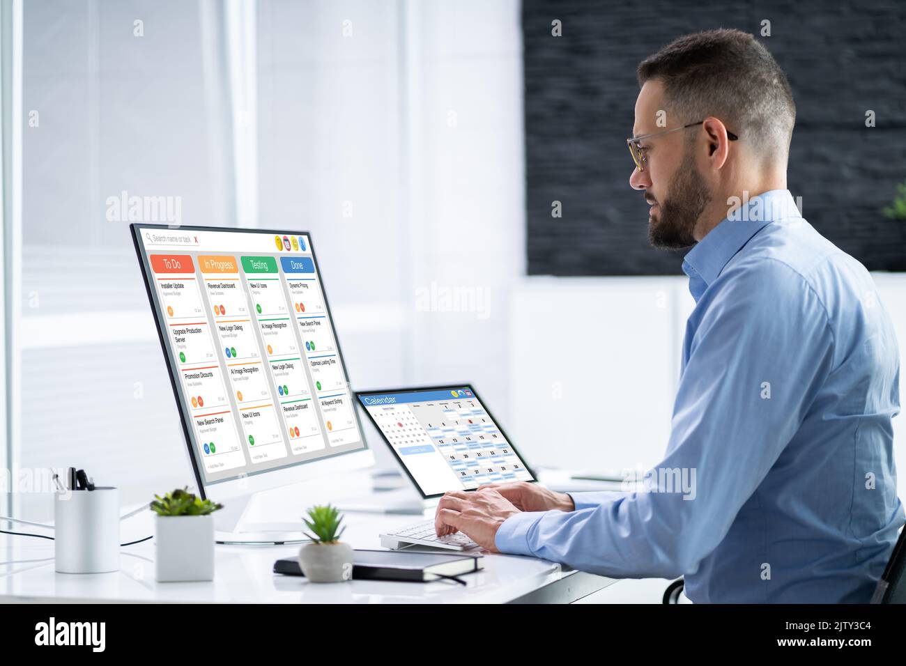 Kanban Project Management Software On Laptop. Digital Calendar Schedule Stock Photo