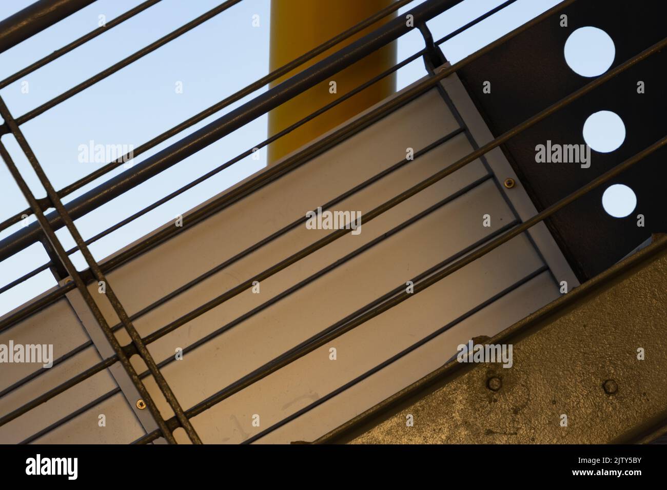 Modern geometric metallic stair railing Stock Photo