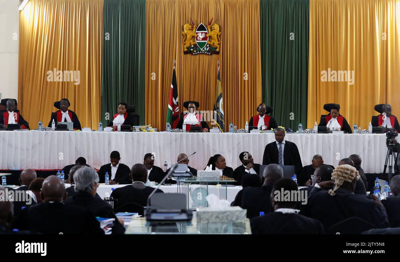 Kenya's Supreme Court judges led by Chief Justice Martha Koome flanked by her deputy, Philomena Mwilu and judges Isaac Lenaola, Smokin Wanjala, Mohamed Ibrahim, Njoki Ndung'u and William Ouko attend the final hearing day over a petition seeking to invalidate the outcome of the recent presidential election, at the Supreme Court in Nairobi, Kenya September 2, 2022. REUTERS/Thomas Mukoya Stock Photo