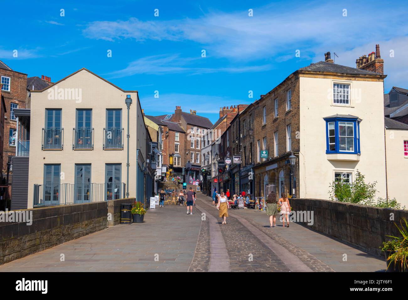 Historic commercial buildings on Elvet Bridge Street in historic city
