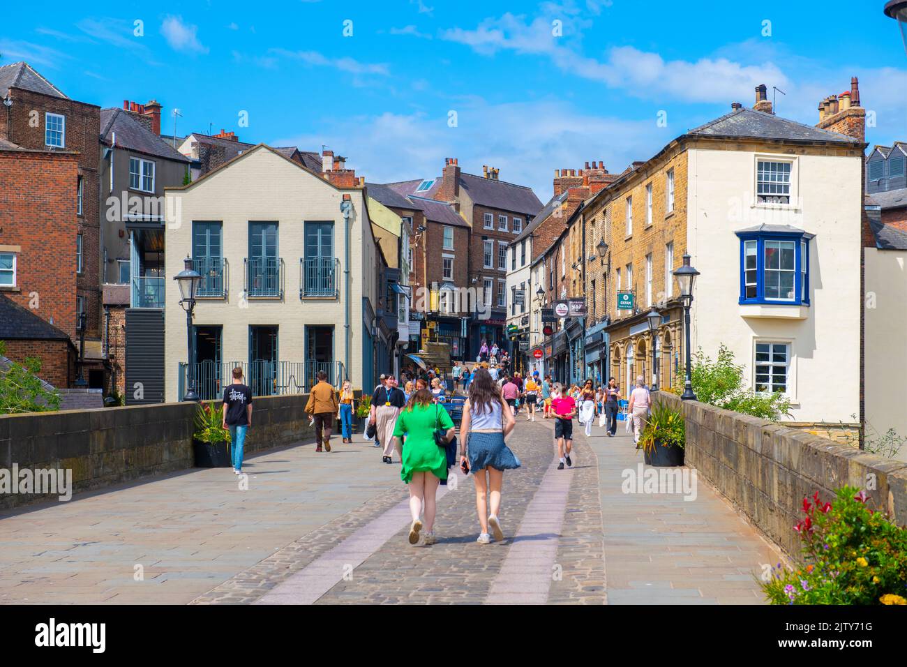Historic commercial buildings on Elvet Bridge Street in historic city