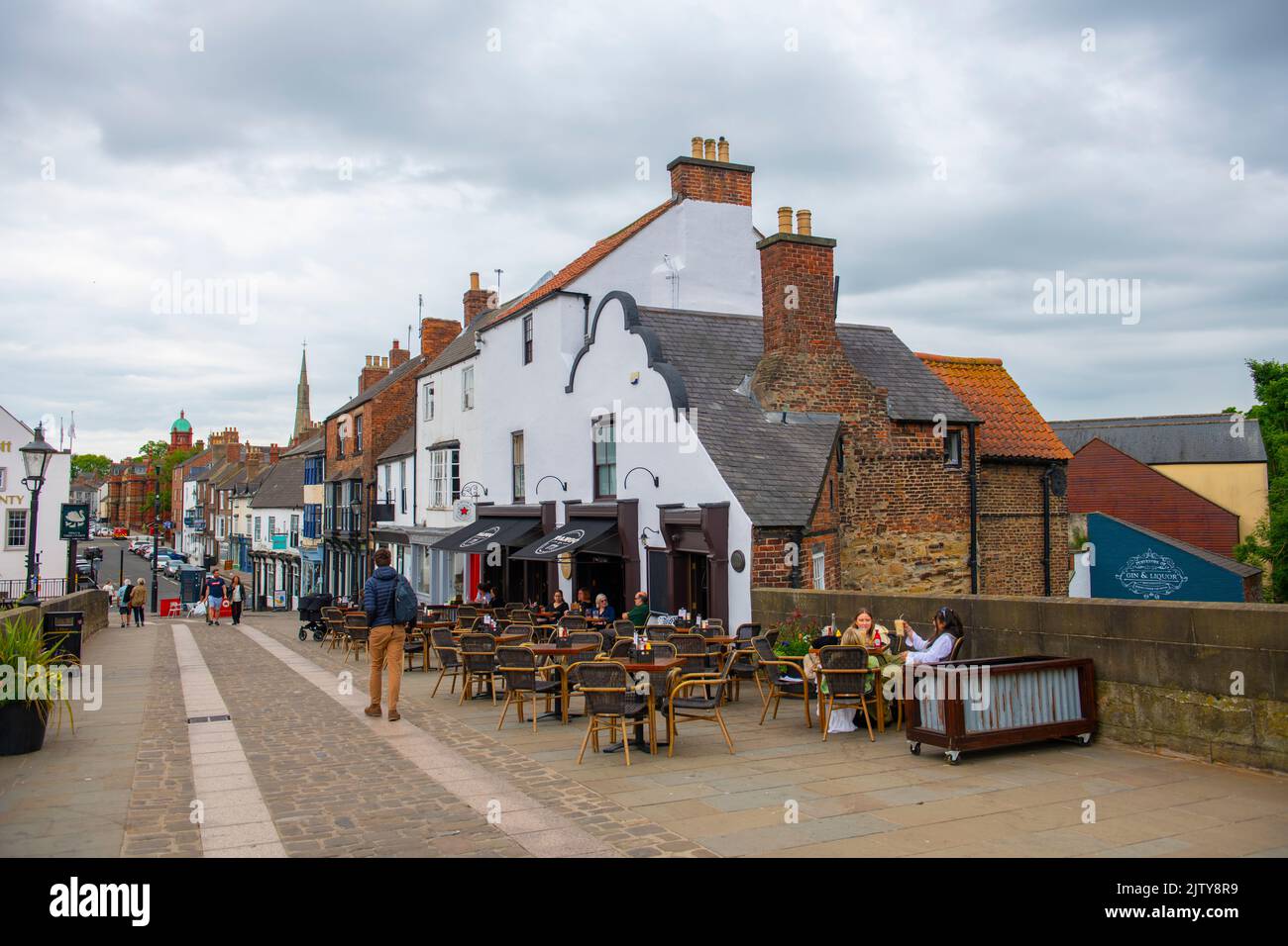Historic commercial buildings on Elvet Bridge Street in historic city