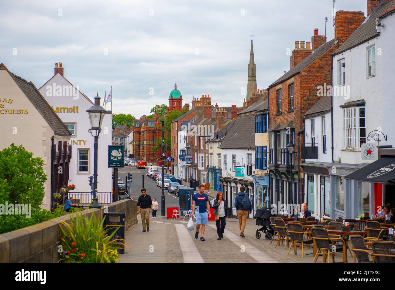 Historic commercial buildings on Elvet Bridge Street in historic city