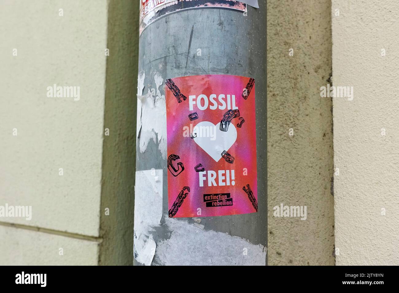 Sticker, fossil free, Extinction Rebellion, Berlin Stock Photo