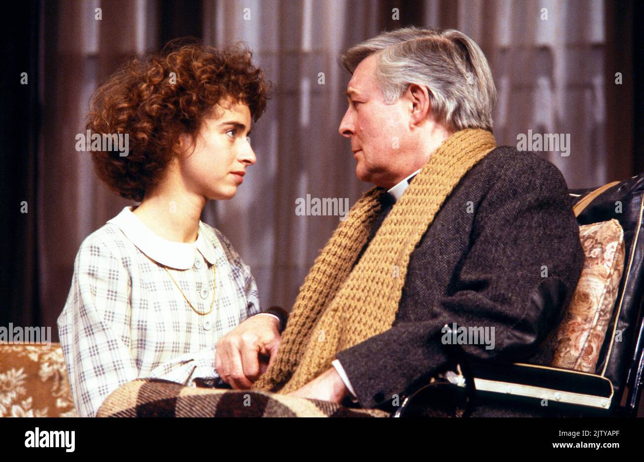 Katharine Schlesinger (Rose Pemberton), Paul Daneman (Father James Brown) in THE LIVING ROOM by Graham Greene at the Royalty Theatre, London WC2  22/10/1987  design: Carl Toms  lighting: Leonard Tucker  director: Bryan Forbes Stock Photo