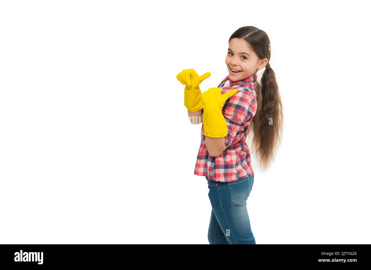 well done. Cleaning supplies advertisement. small girl cleaning in rubber gloves. kid clean house in latex gloves. Yellow gloves for cleaning the hous Stock Photo