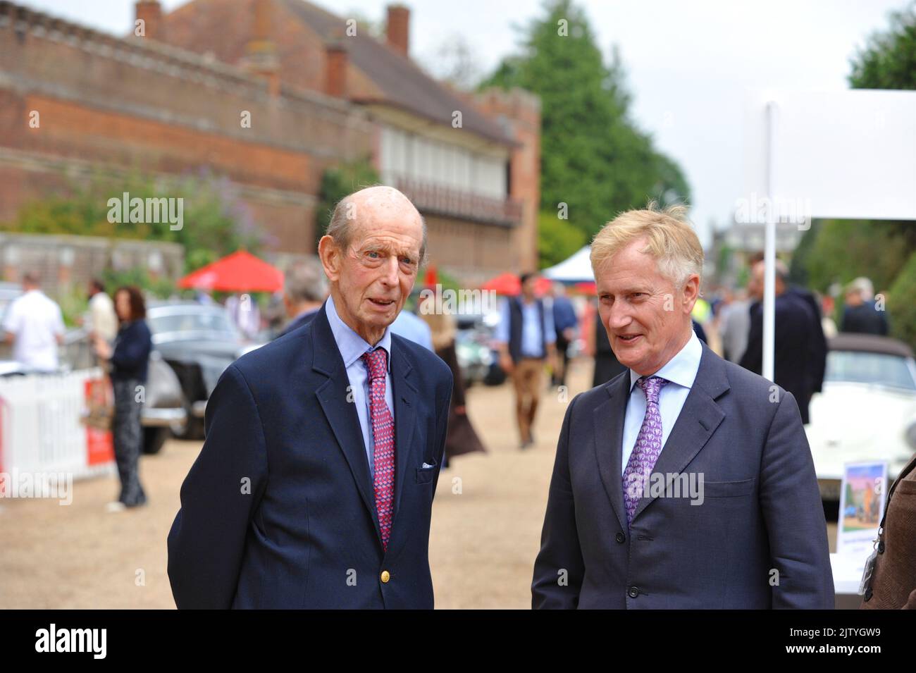 His Royal Highness the Duke of Kent being shown around the 2022 Concours of Elegance by James Brooks-Ward, (Managing Director, Thorough Events) which is taking place in the grounds of Hampton Court Palace, London, UK. The Concours of Elegance brings together a selection of 80 of the rarest cars from around the world - many of which will never have been seen before in the UK. Complementing the Concours of Elegance will be displays of other fine motor cars, including entrants to The Club Trophy. Credit: Michael Preston/Alamy Live News Stock Photo