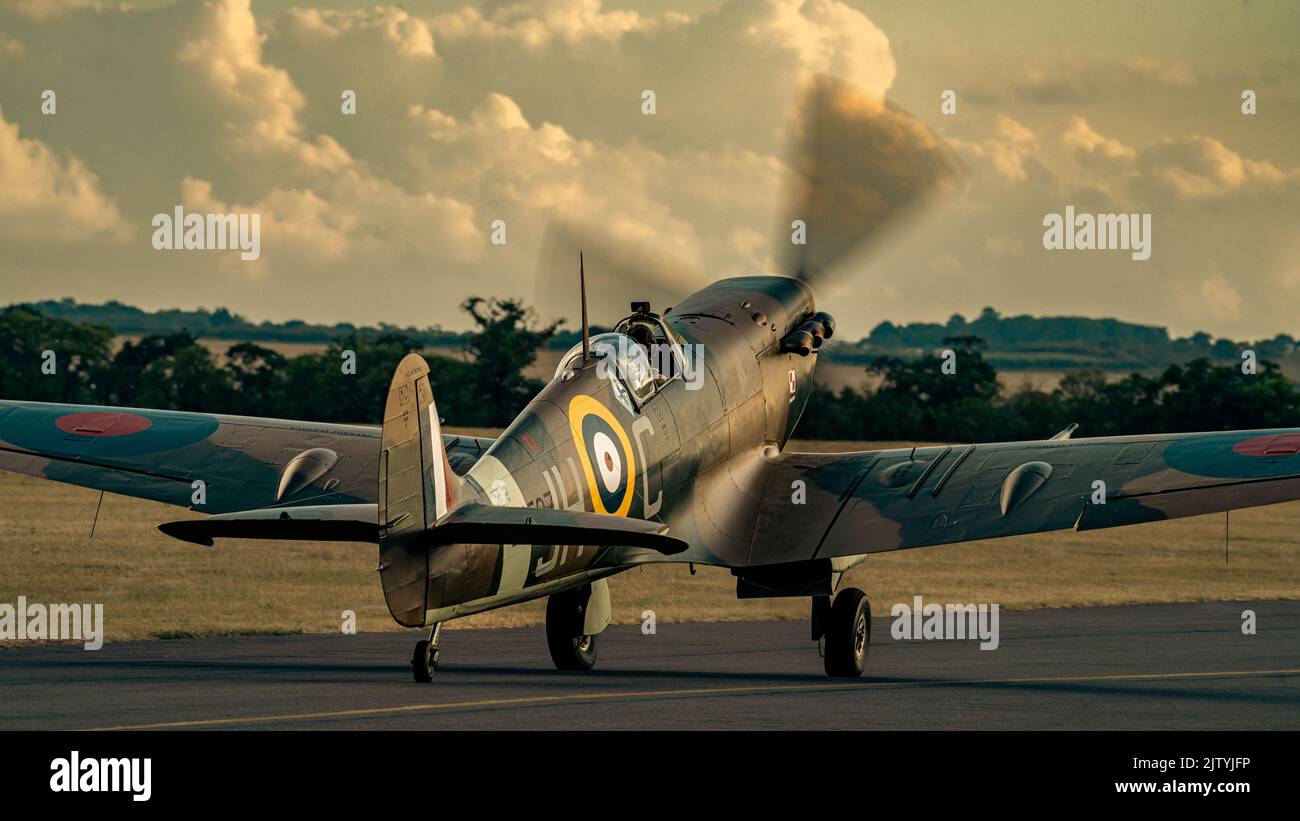Spitfire at Duxford Evening Airshow Stock Photo