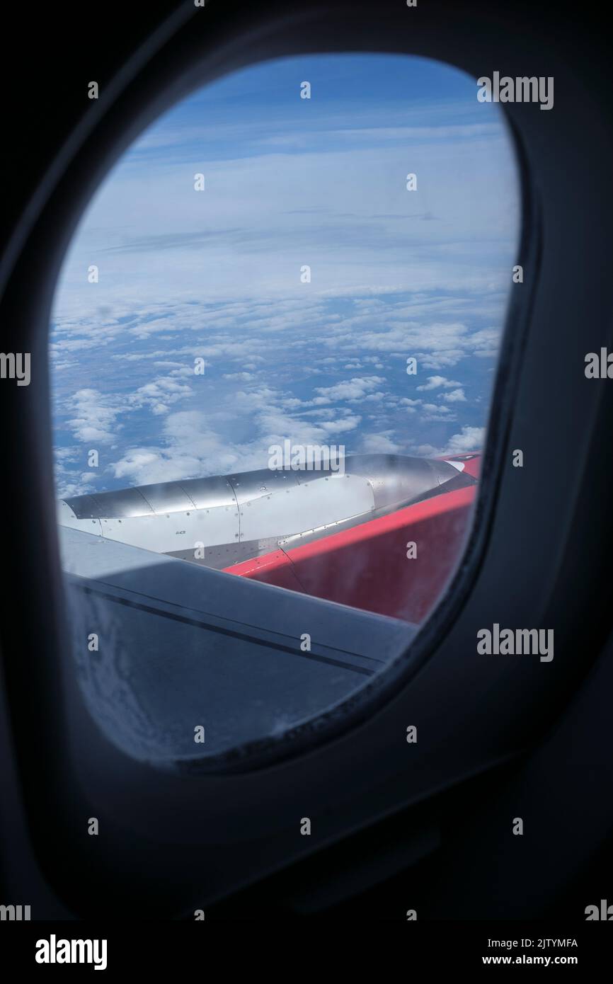 Looking through the window from inside the cabin whilst traveling by plane from Madrid to granada, on a CRJ1000 Bombardier aircraft, Spain Stock Photo