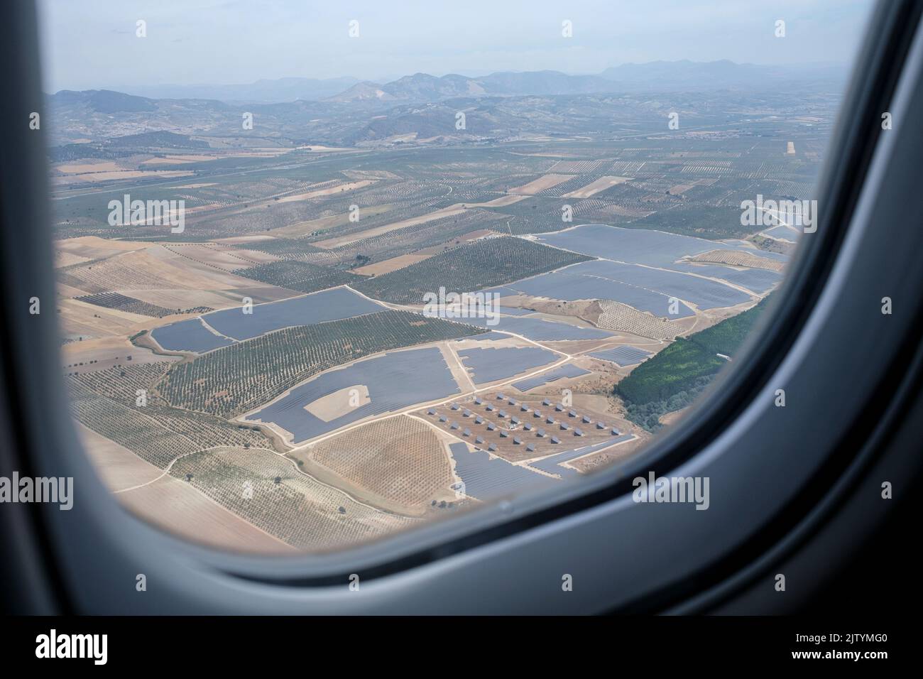 Photovoltaic solar panels from above whilst traveling by plane from Madrid to granada, on a CRJ1000 Bombardier aircraft, Spain Stock Photo