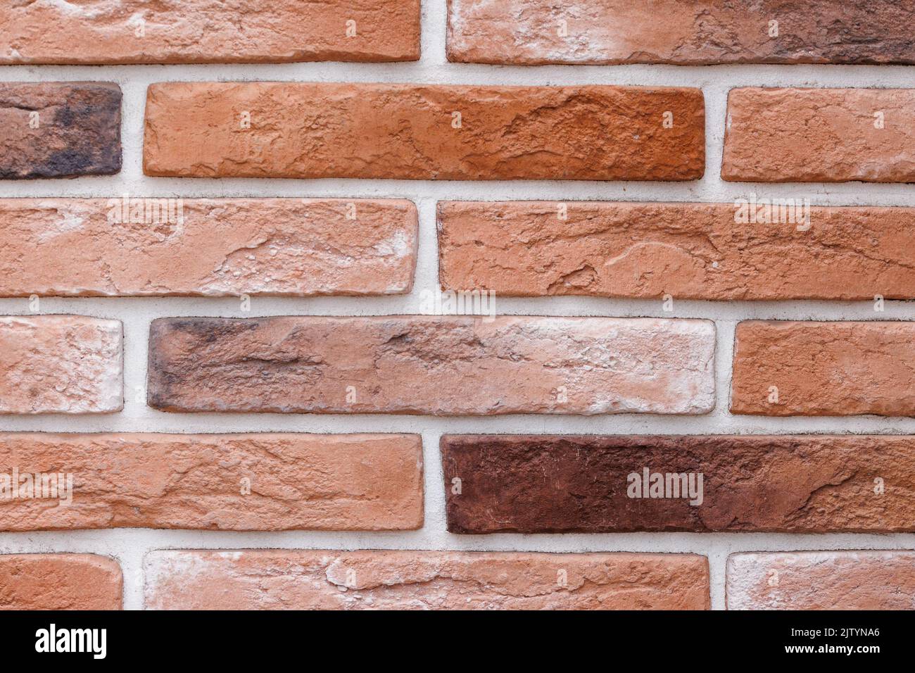 fake brick wall, plastic panel imitating natural brickwork with white
