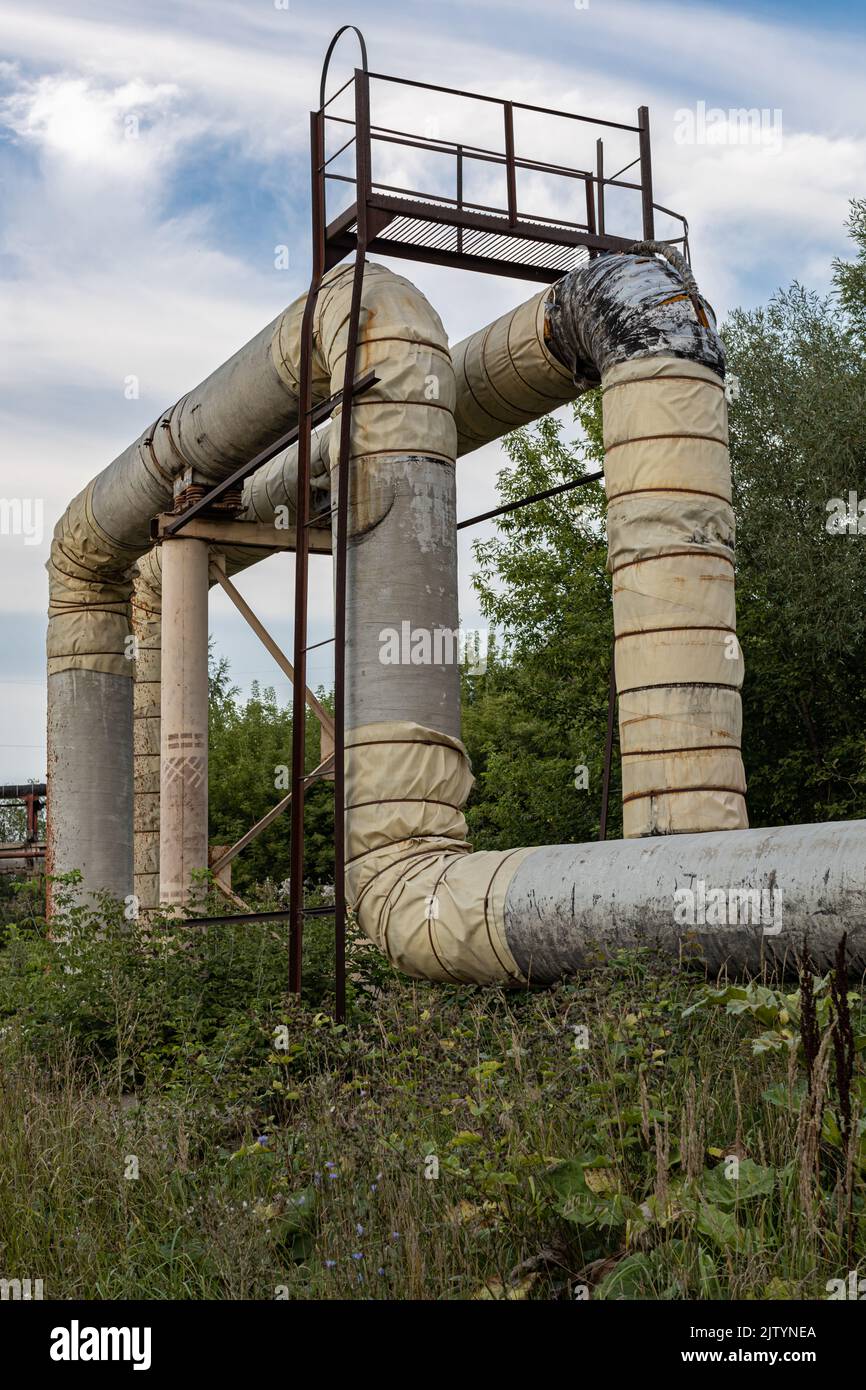 main pipe for water supply on the background of nature Stock Photo